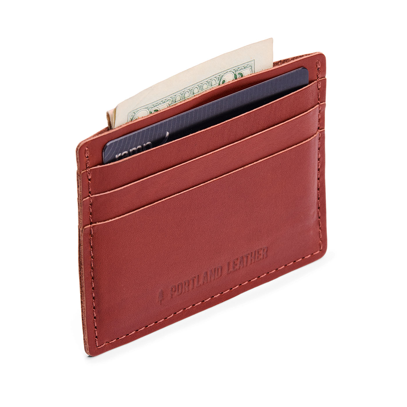 Slim wallet with three card slots and a top slot