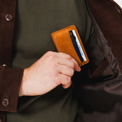 Dakota | Model hodling minimalist leather wallet with card slots