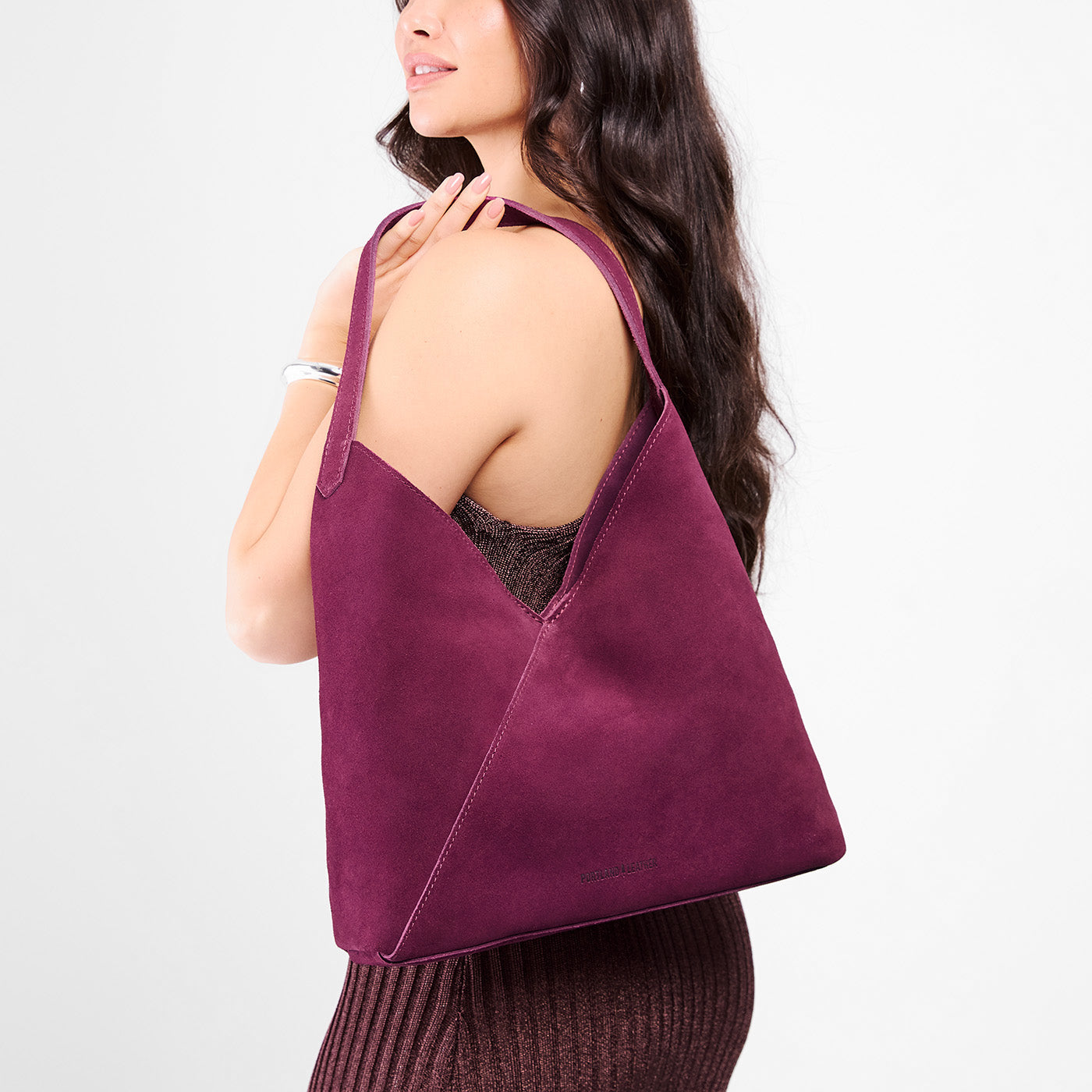 Superbloom*Oversized | Model wearing large shoulder bag with magnetic snap closure