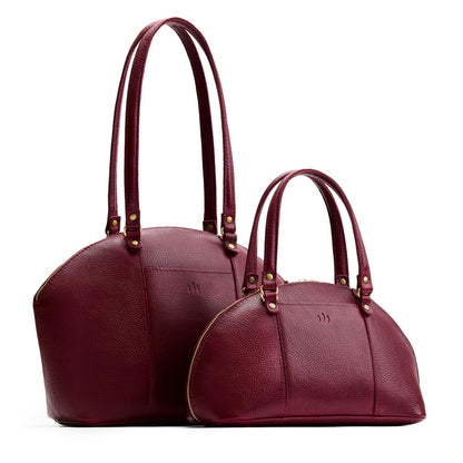 Cabernet | Size comparison of the large and small half circle crossbody bag with handles and removable crossbody strap