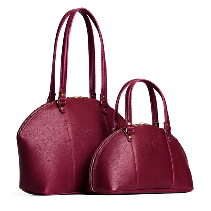 Orchid | Size comparison of the large and small half circle crossbody bag with handles and removable crossbody strap