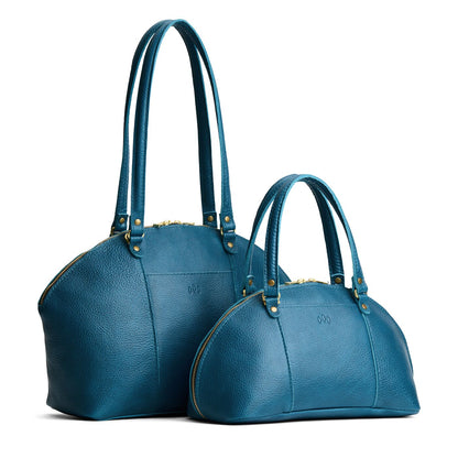 Planetary | Size comparison of the large and small half circle crossbody bag with handles and removable crossbody strap
