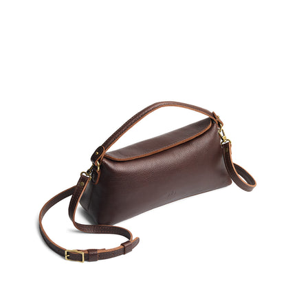 Coldbrew | Leather bowler bag with magnetic closure against a white background