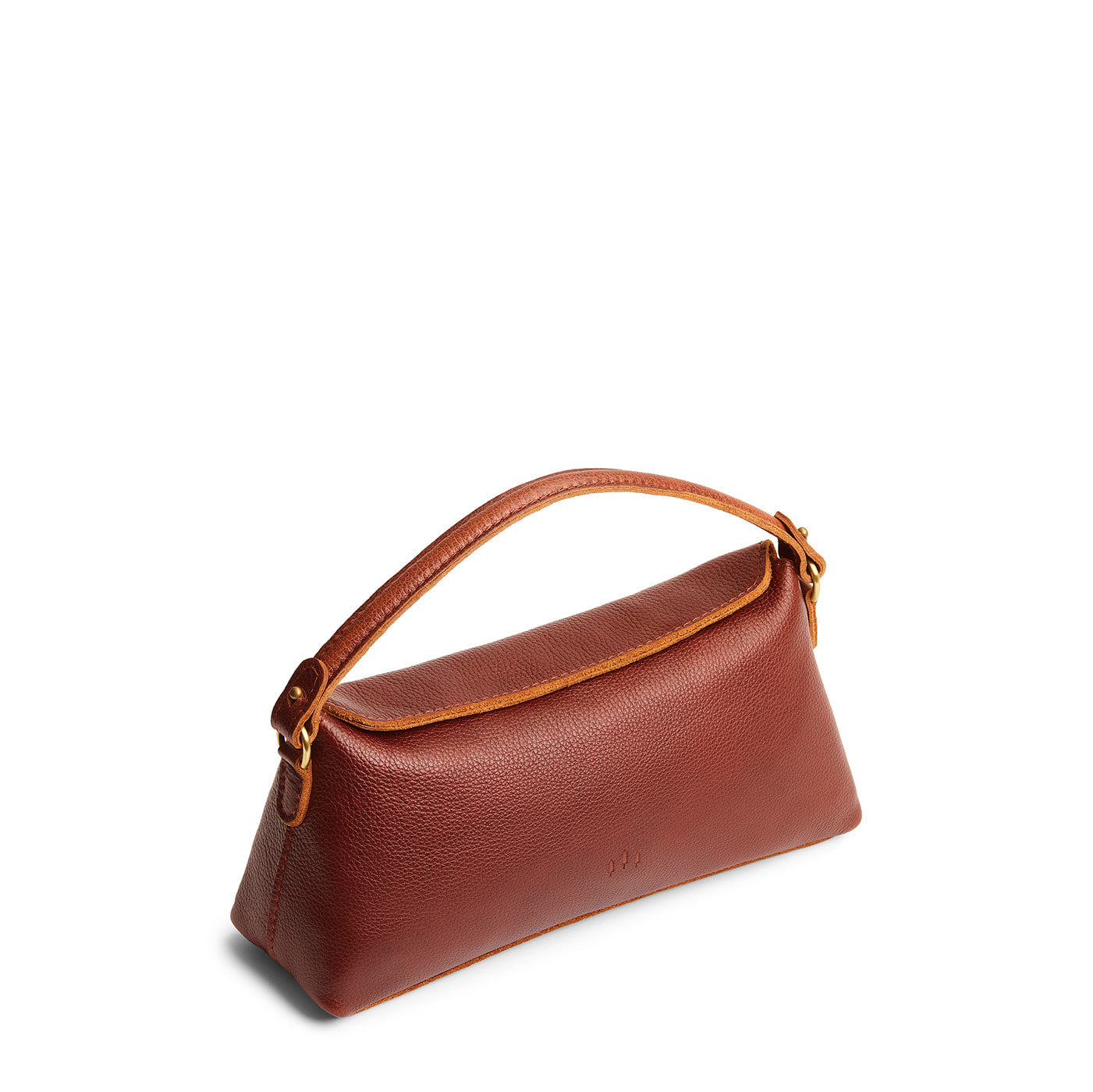 Nutmeg | Leather bowler bag with magnetic closure against a white background