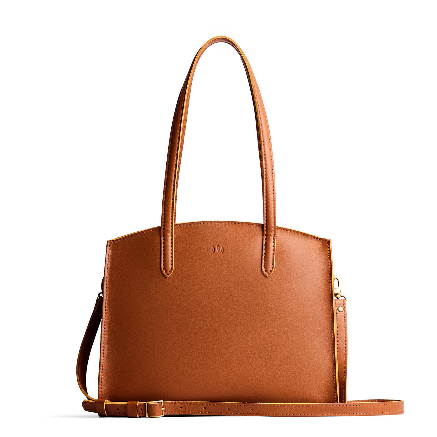 Honey*Large | Leather tote bag with handles, adjustable crossbody strap, zipper top, and two back pockets