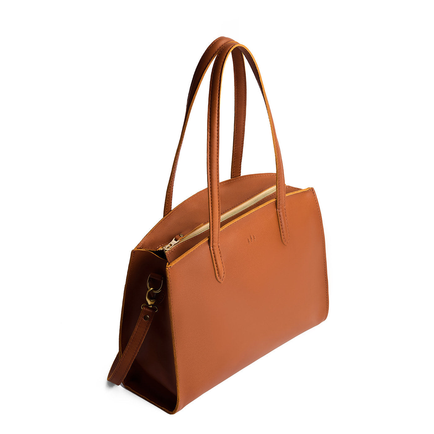 Honey*Large | Leather tote bag with handles, adjustable crossbody strap, zipper top, and two back pockets