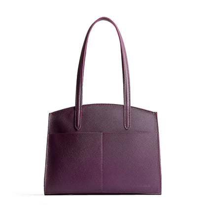 Plum*Large | Leather tote bag with handles, adjustable crossbody strap, zipper top, and two back pockets