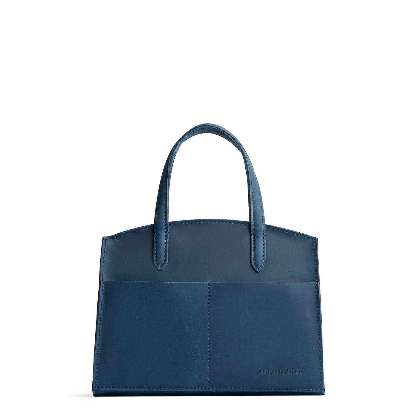 Deep Water*Medium | Leather tote bag with handles, adjustable crossbody strap, zipper top, and two back pockets