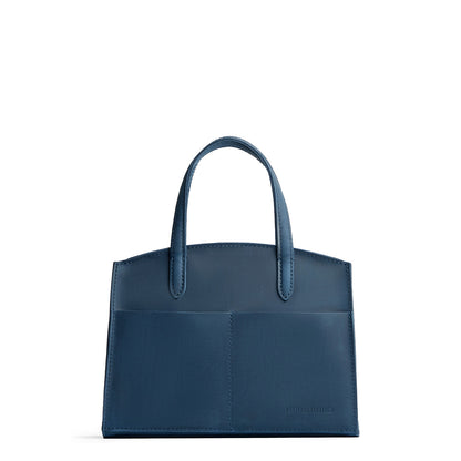 Deep Water*Medium | Leather tote bag with handles, adjustable crossbody strap, zipper top, and two back pockets