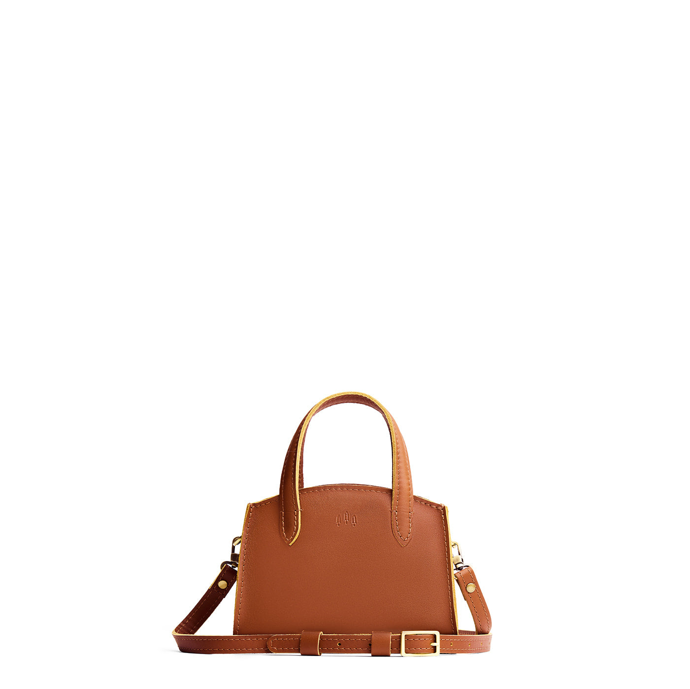 Honey*Mini | Leather tote bag with handles, adjustable crossbody strap, zipper top, and a back pocket