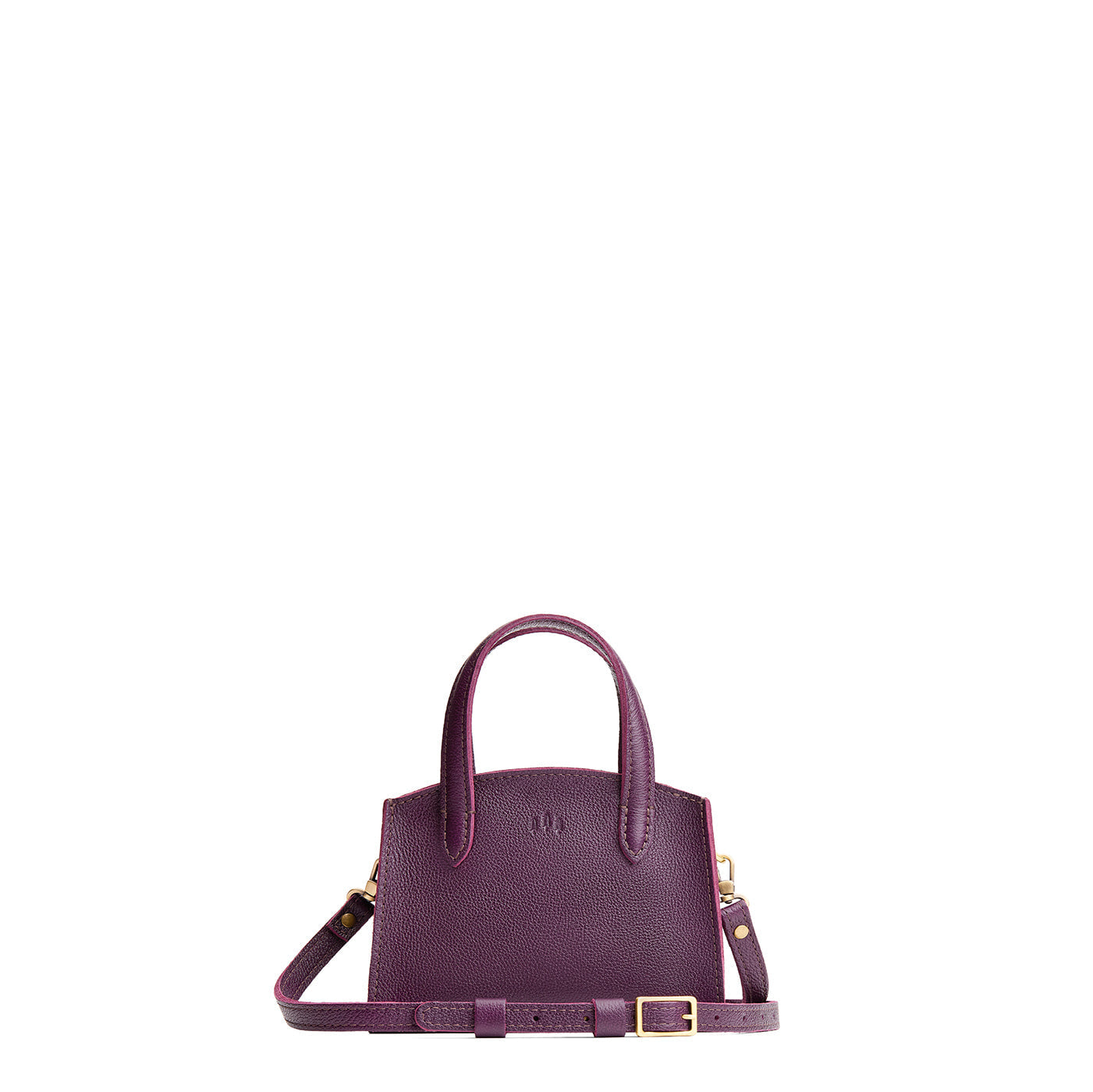 Plum*Mini | Leather tote bag with handles, adjustable crossbody strap, zipper top, and a back pocket