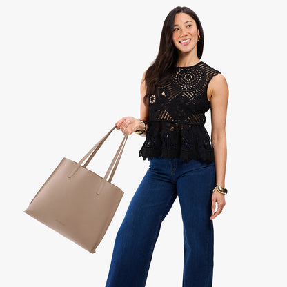 Stone*Large | Model carrying leather tote bag with matching leather handles