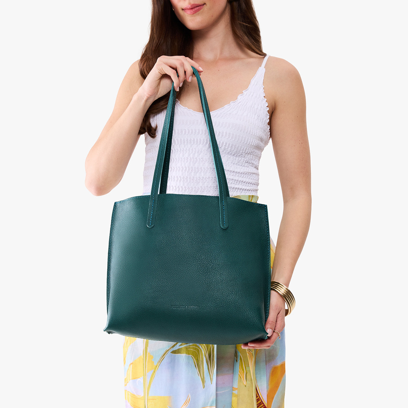 Sea Glass*Medium | Model carrying leather tote bag with matching leather handles