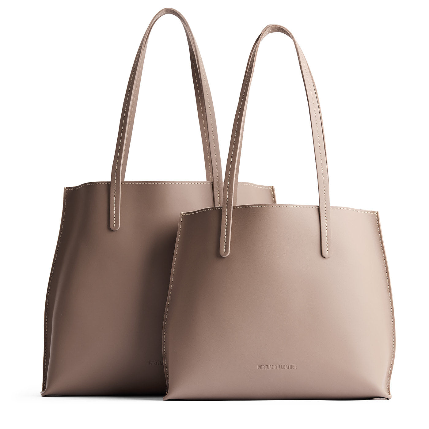 Stone | Side by side comparison of both sizes of leather totes