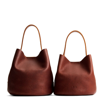 Nutmeg | Size comparison image of two symmetrical leather bucket bags