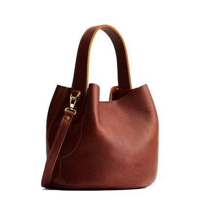Nutmeg*Small | Symmetrical bucket bag with handle, latch closure, and removable crossbody strap