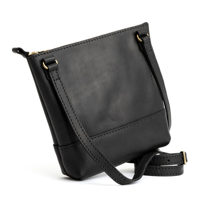 Black | Small rectangular crossbody purse with top zipper and interior pocket