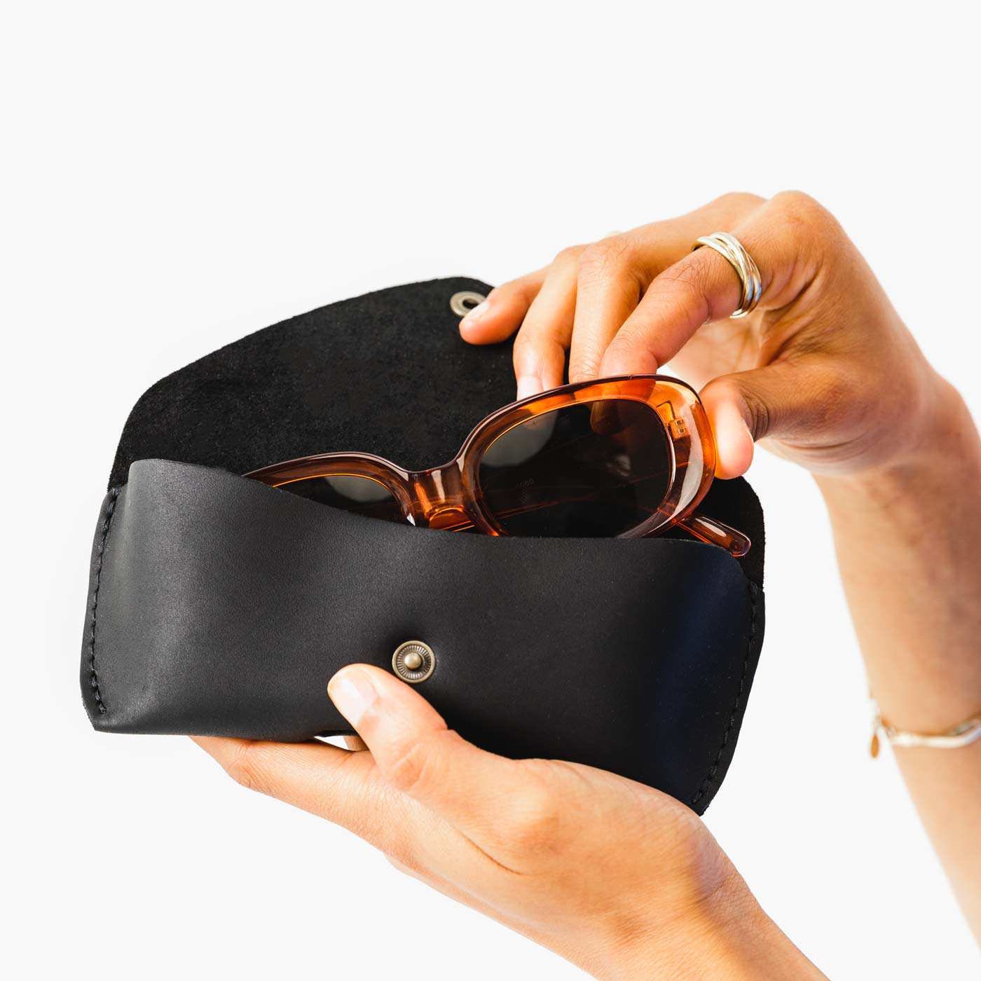 Black | Leather sunglasses case with snap closure