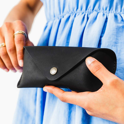 Black | Leather sunglasses case with snap closure