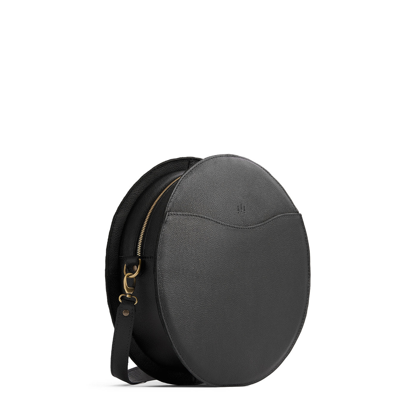 Pebbled--black | Large circle shaped leather bag with top zipper and carrying strap