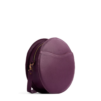 Plum | Large circle shaped leather bag with top zipper and carrying strap