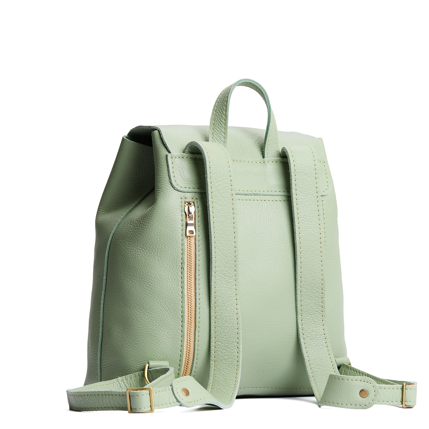 Pistachio | Leather backpack with magnetic flap closure on a white