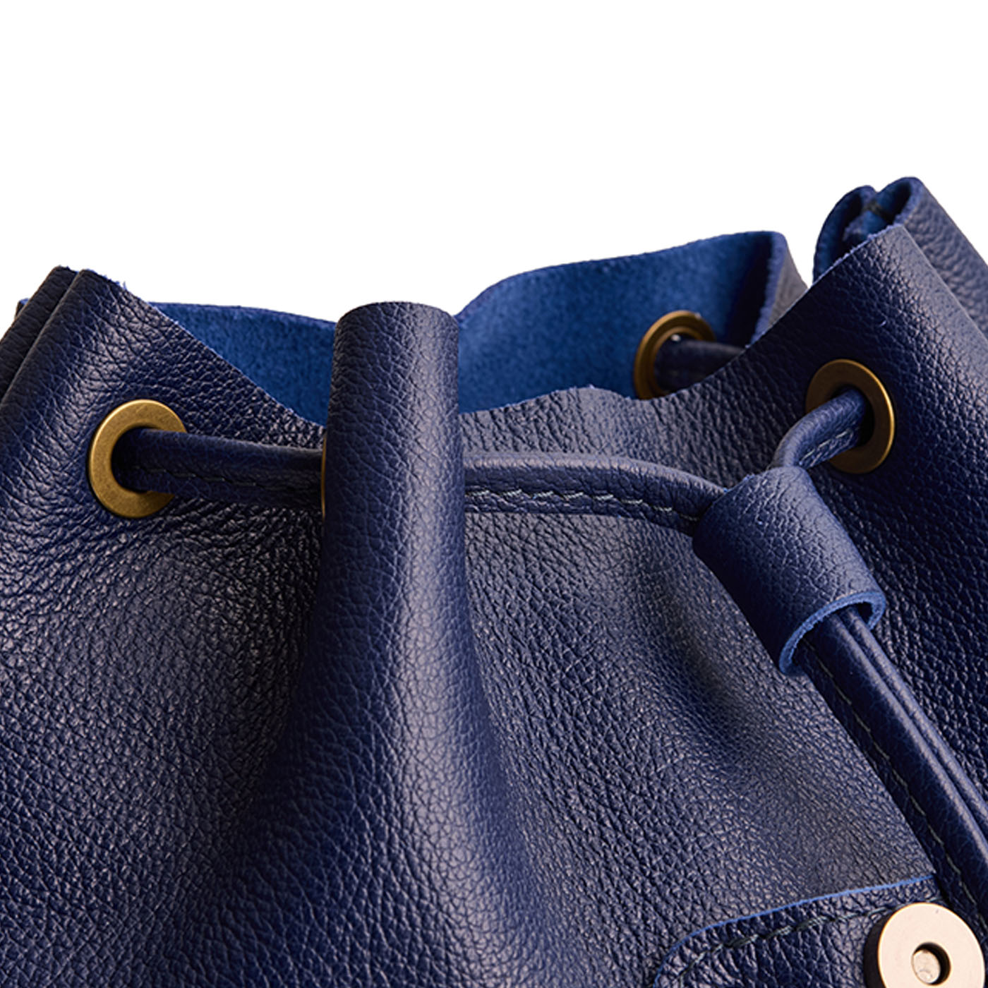 Cobalt | Close up of a Drawstring bucket backpack with snap closure