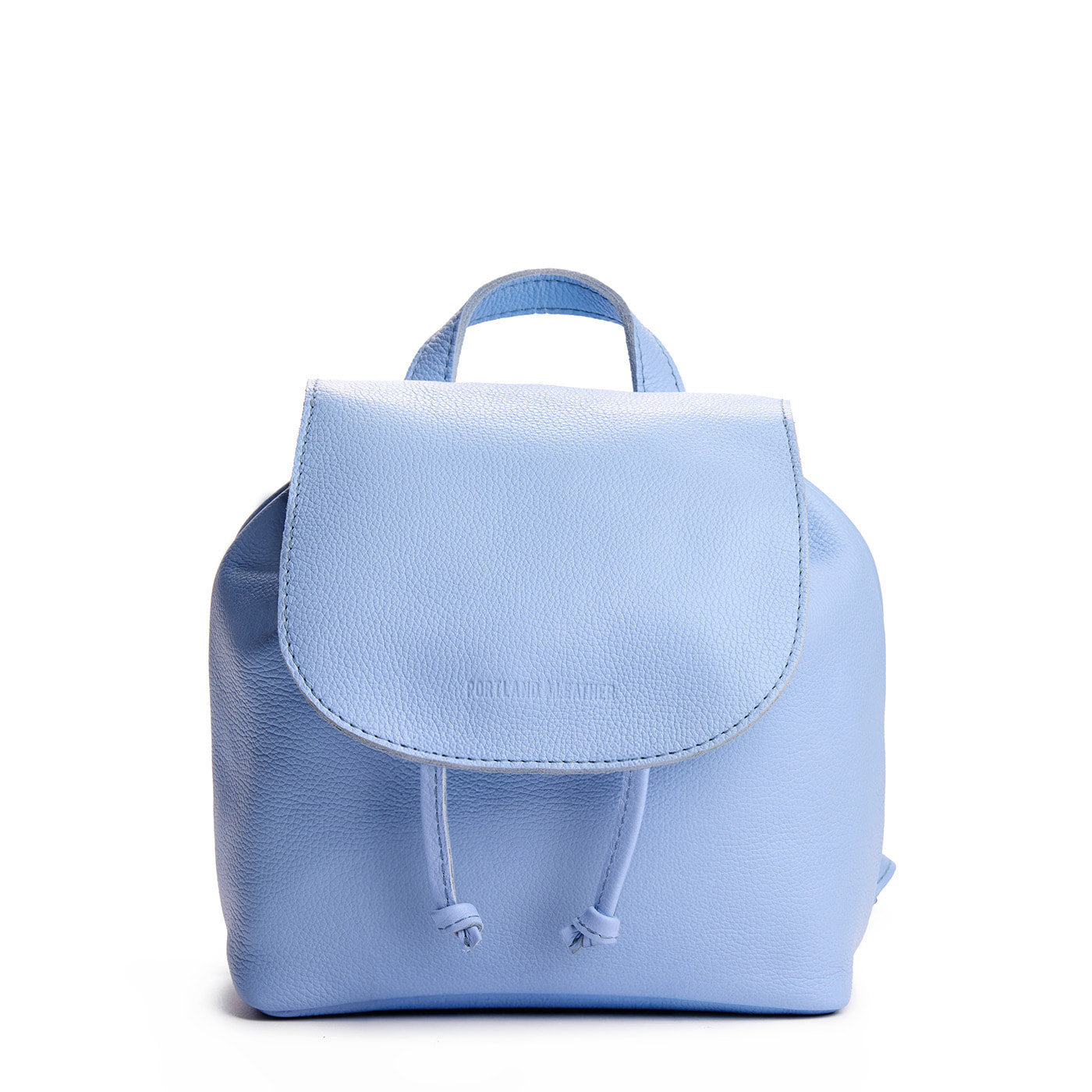 Skyway | Drawstring bucket backpack with snap closure under flap