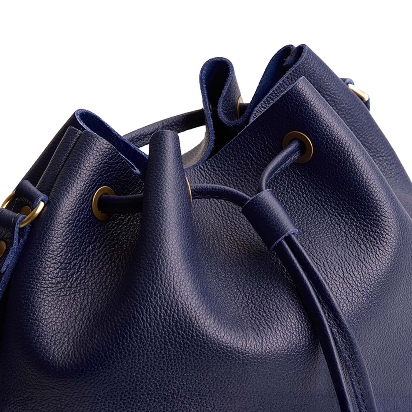 Cobalt | Close-up of slouchy crossbody bag with leather drawstring closure