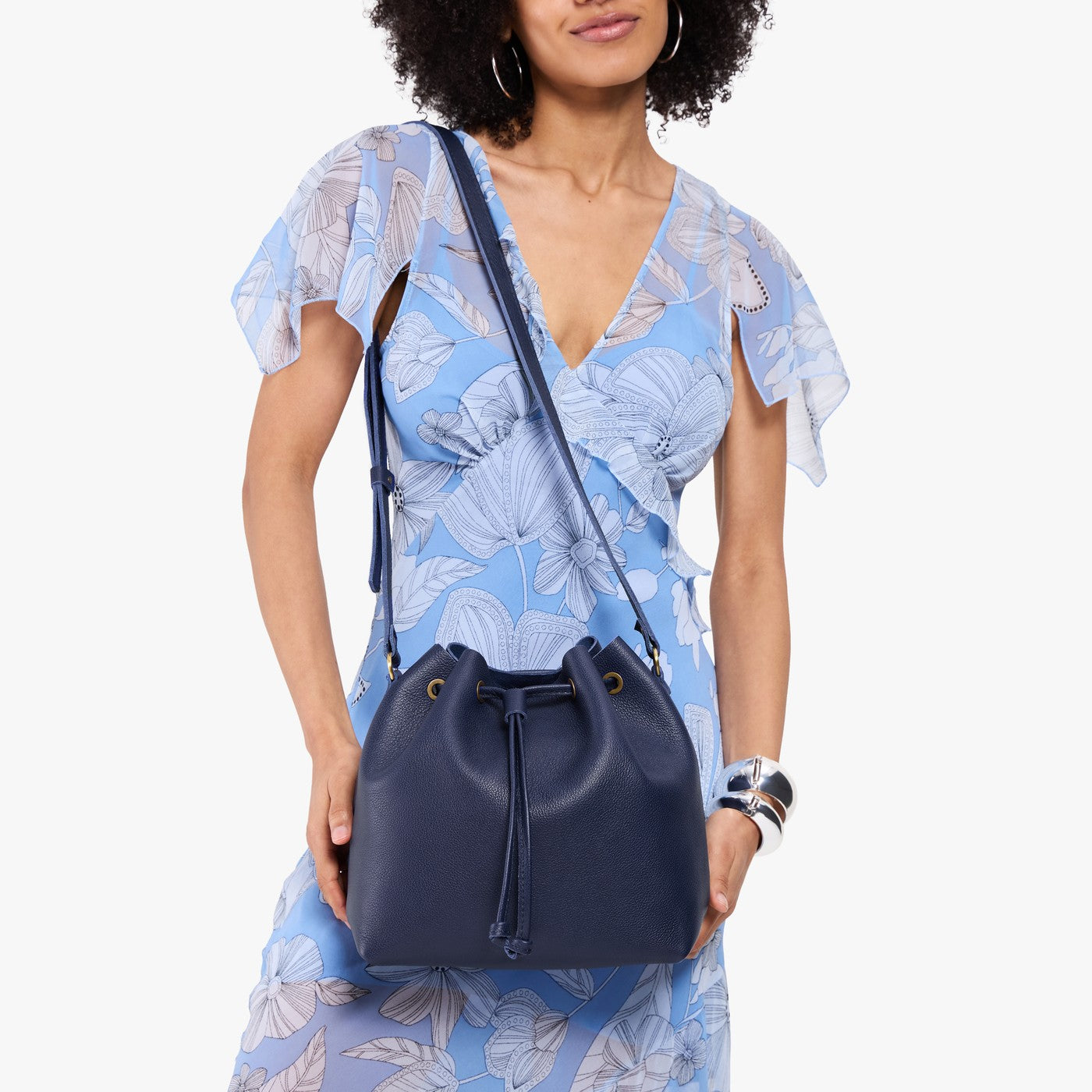 Cobalt*Large | Model wearing slouchy crossbody bag with drawstring closure