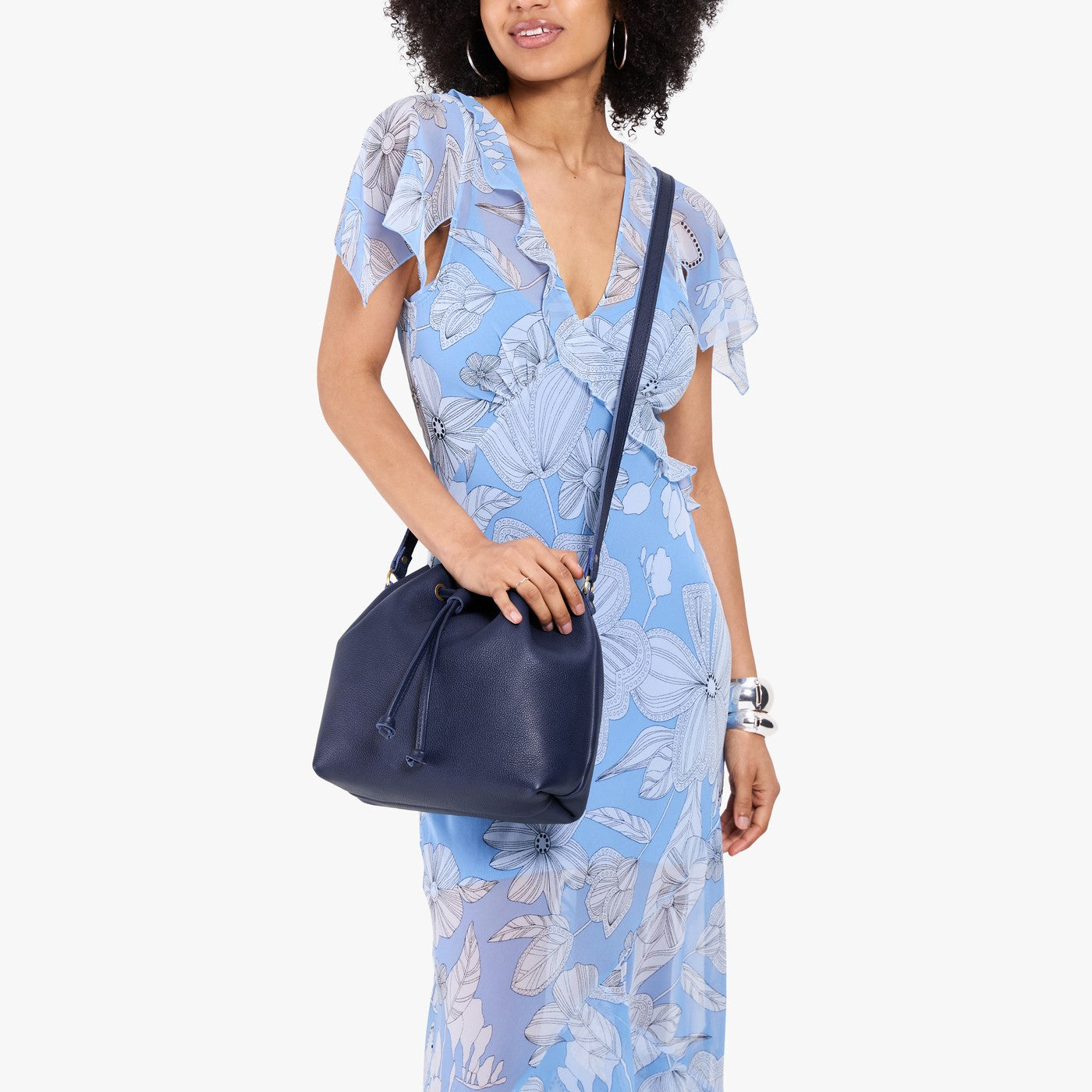 Cobalt*Large | Model wearing slouchy crossbody bag with drawstring closure