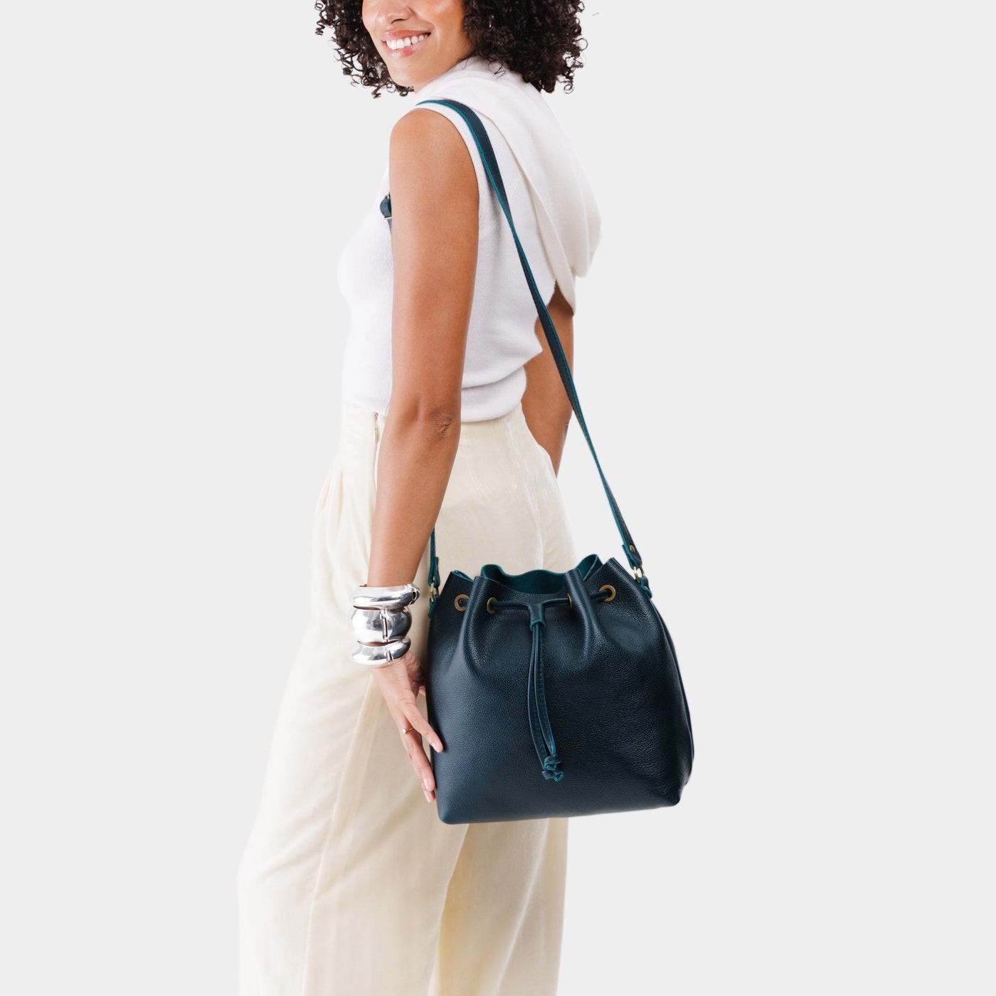 Boreal*Large | Model wearing slouchy crossbody bag with drawstring closure