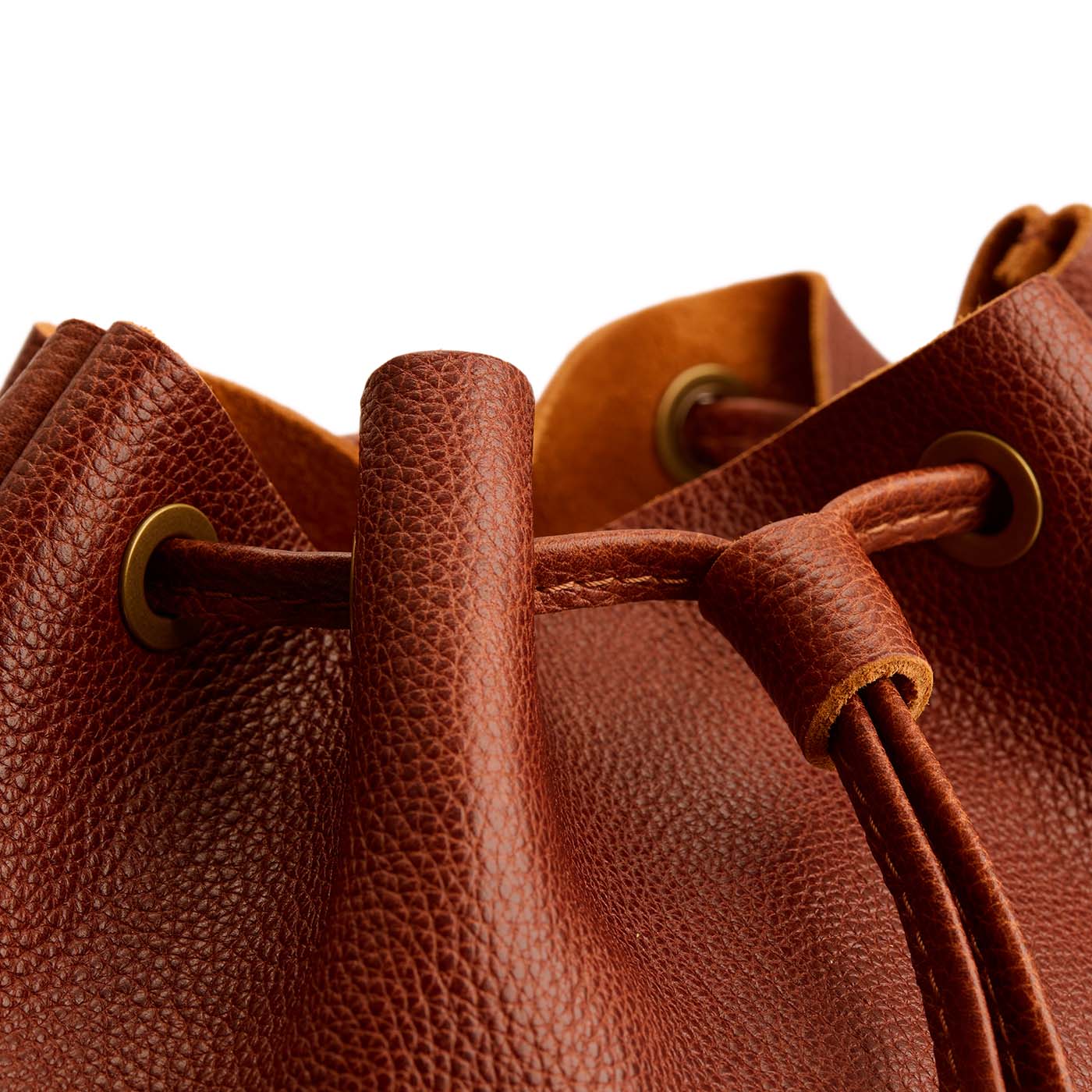 Nutmeg | Close-up of slouchy crossbody bag with leather drawstring closure