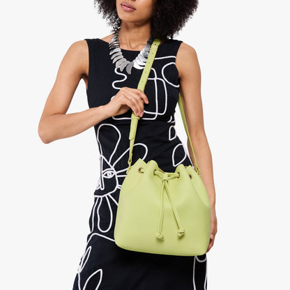 Shadow Lime*Large | Model wearing slouchy crossbody bag with drawstring closure