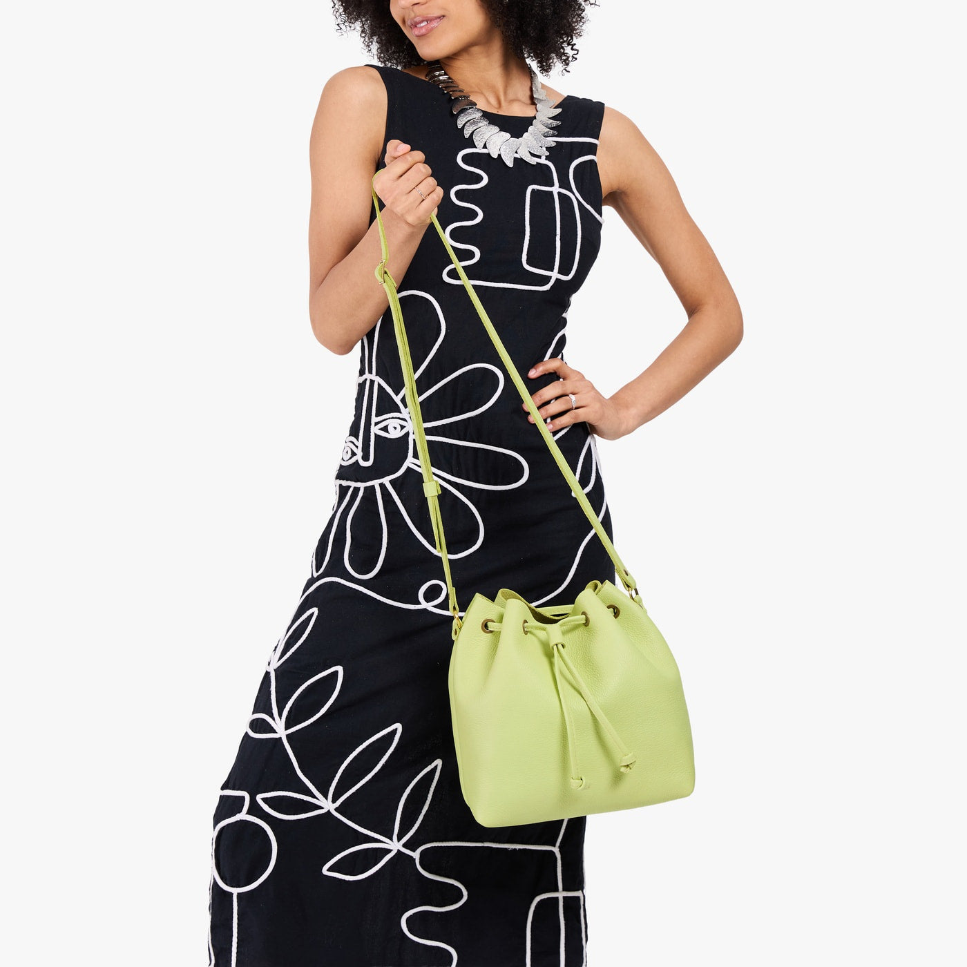 Shadow Lime*Large | Model wearing slouchy crossbody bag with drawstring closure