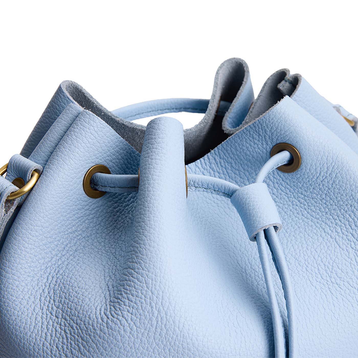 Skyway | Close-up of slouchy crossbody bag with leather drawstring closure
