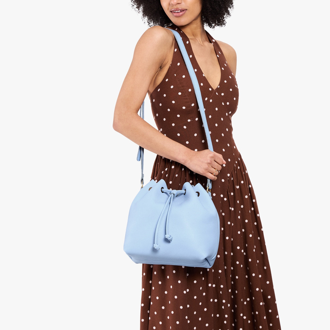 Skyway*Large | Model wearing slouchy crossbody bag with drawstring closure