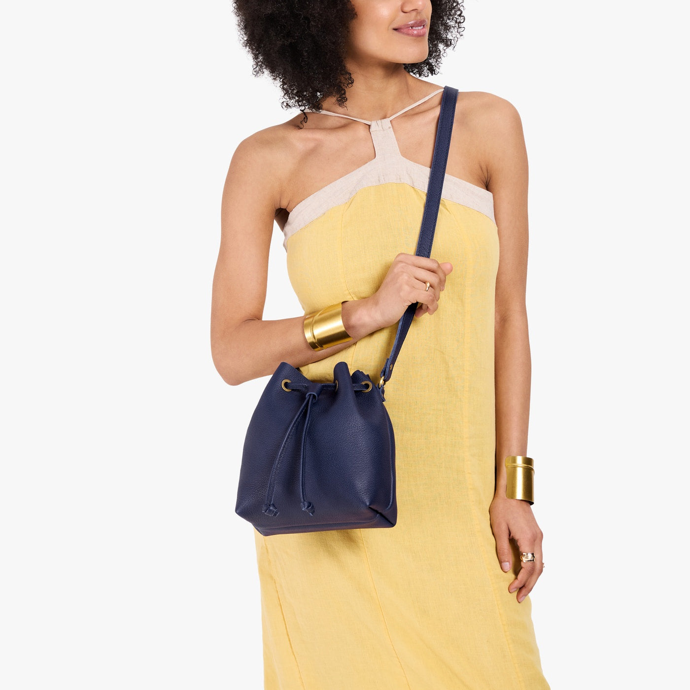 Cobalt*Small | Model wearing slouchy crossbody bag with drawstring closure