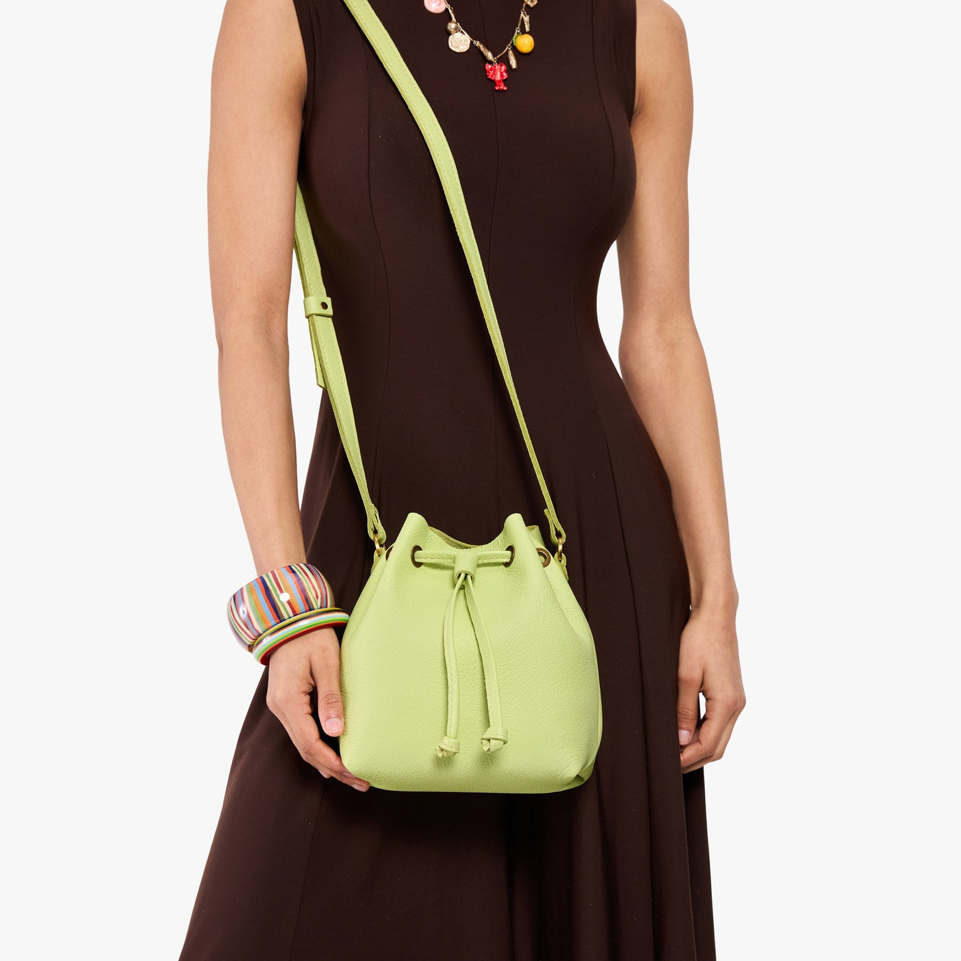 Shadow Lime*Small | Model wearing slouchy crossbody bag with drawstring closure