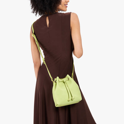 Shadow Lime*Small | Model wearing slouchy crossbody bag with drawstring closure