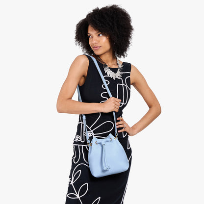 Skyway*Small | Model wearing slouchy crossbody bag with drawstring closure