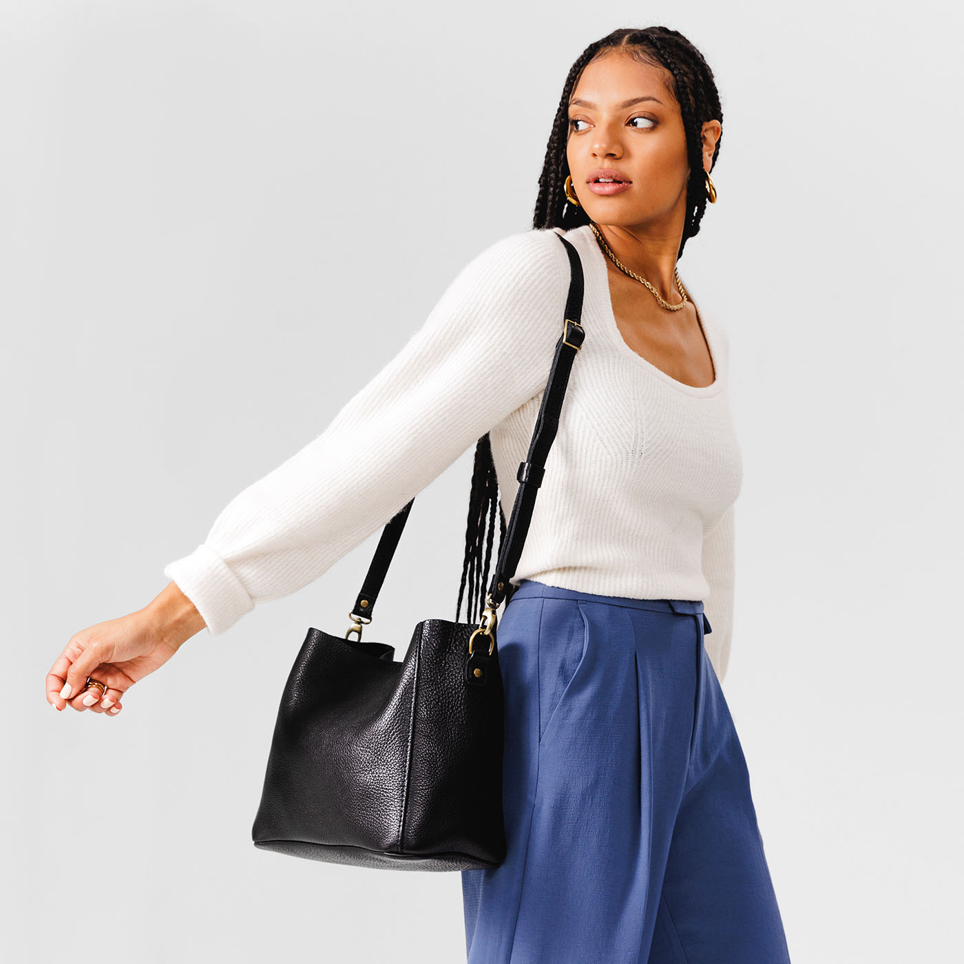 Pebbled--black | symmetrical bucket bag with latch closure and removable crossbody strap
