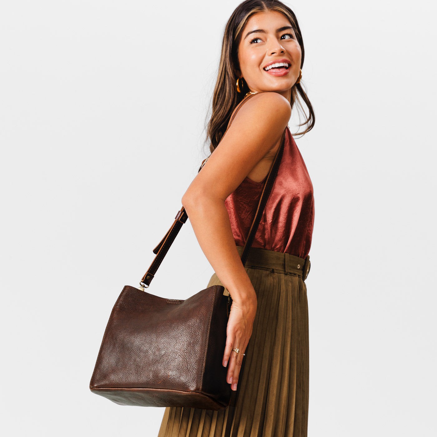 Coldbrew | symmetrical bucket bag with latch closure and removable crossbody strap