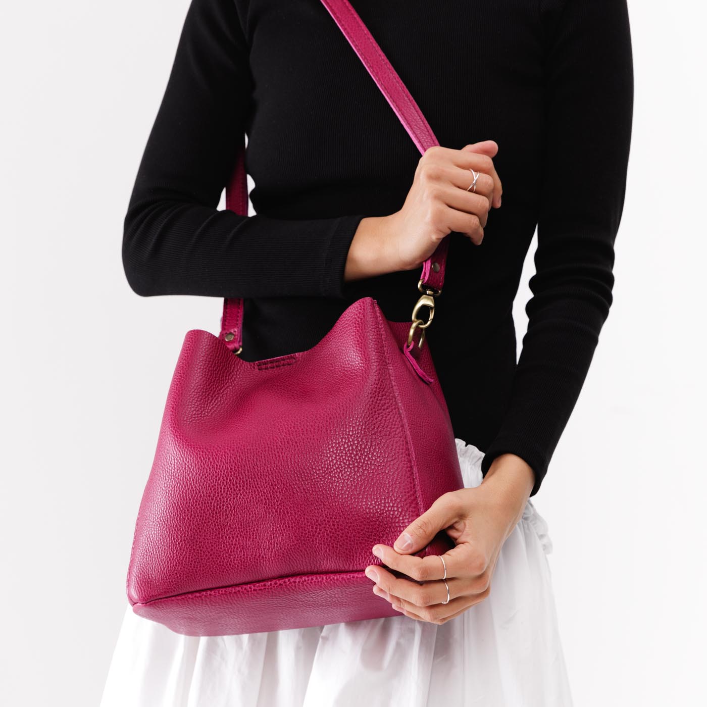 Cosmo | symmetrical bucket bag with latch closure and removable crossbody strap