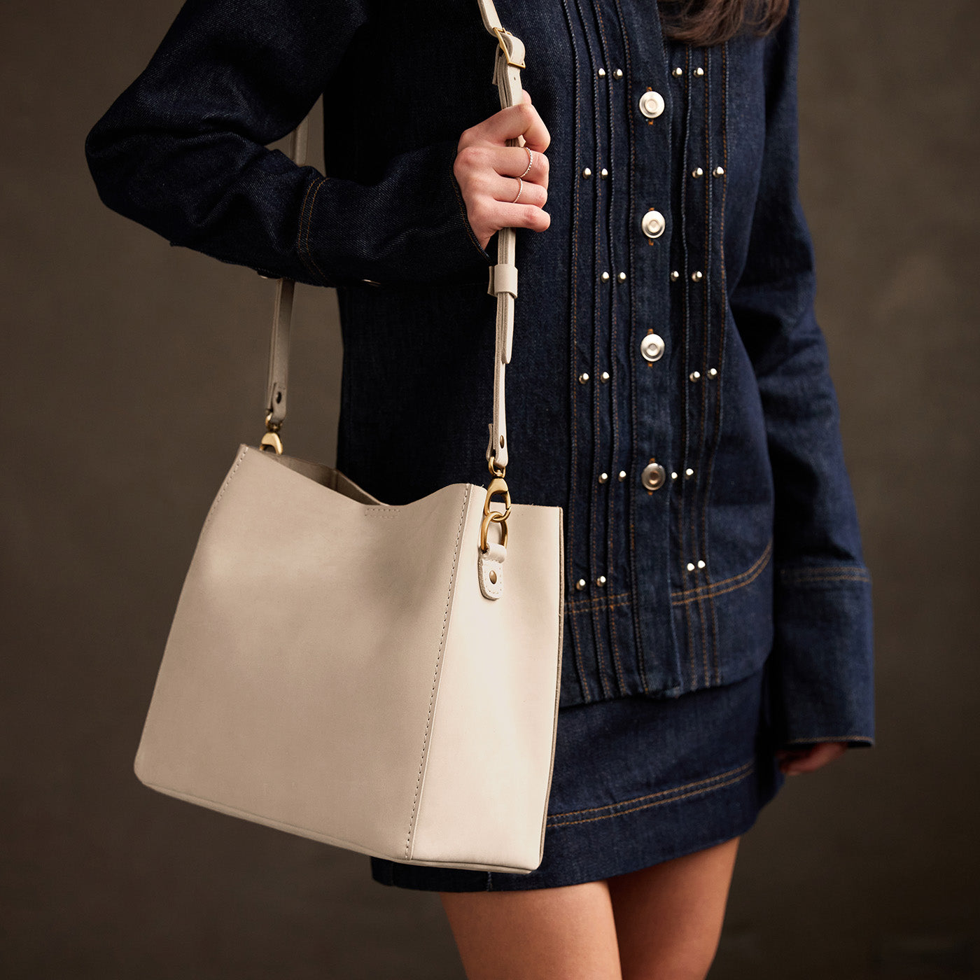 Dragon Bone | symmetrical bucket bag with latch closure and removable crossbody strap