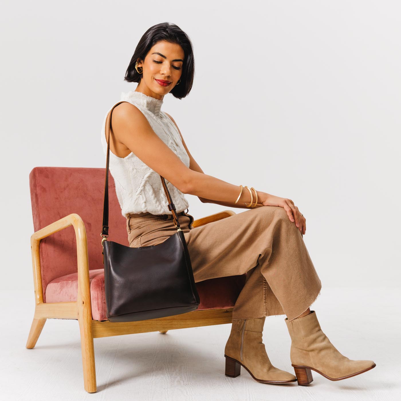 Grizzly | symmetrical bucket bag with latch closure and removable crossbody strap