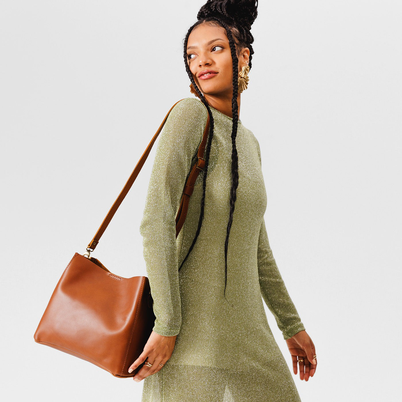 Honey | symmetrical bucket bag with latch closure and removable crossbody strap
