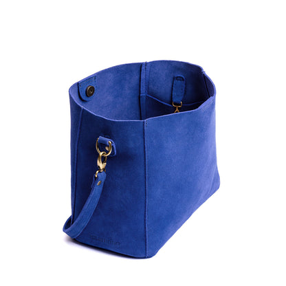 Joni Blue | symmetrical bucket bag with latch closure and removable crossbody strap