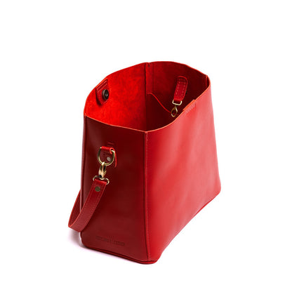 Ruby | symmetrical bucket bag with latch closure and removable crossbody strap