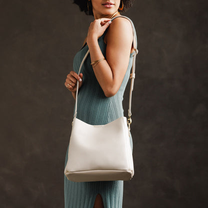 Bone | symmetrical bucket bag with latch closure and removable crossbody strap